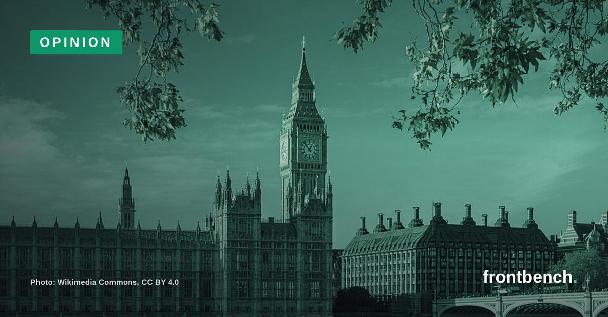 The Palace of Westminster and Elizabeth Tower seen from the Thames, in Frontbench's dark editorial style, with an Opinion label.
