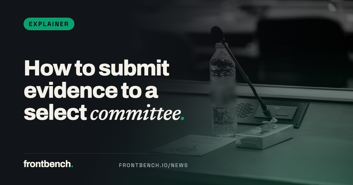 A microphone and a bottle of water on a committee hearing desk, tinted green, with the headline How to submit evidence to a select committee.